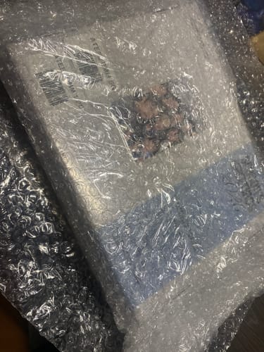 Customer's ATEEZ 2026 SEASON'S GREETINGS box protected by bubble wrap upon arrival.