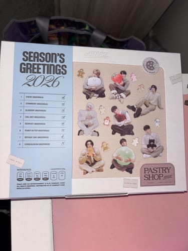 Customer's photo of the ATEEZ - 2026 SEASON'S GREETINGS outer box, which features a 'PASTRY SHOP' theme with member photos.