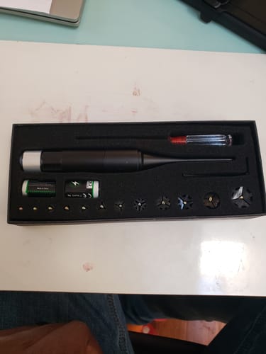 Customer's Site Right™ 2.0 - Boresighter kit laid out in its black case, showing the tool and various accessories.