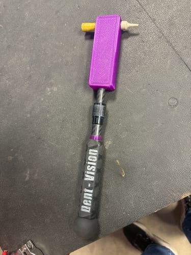 Customer's purple Dent Vision Dent Zapper Paddle with a black rubber ball added to the handle for balance.