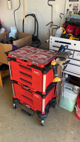 Customer's Willey Quick Packout Top installed on a red Milwaukee tool cart, with various tools attached.