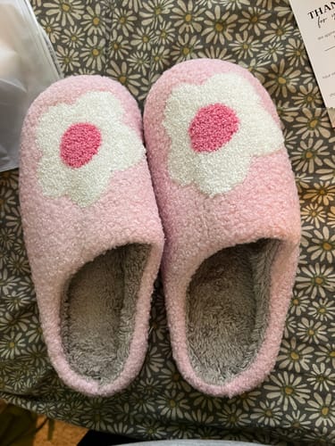 Reviewer's pink Bloom Flower Slides Slippers that arrived squished and flattened.