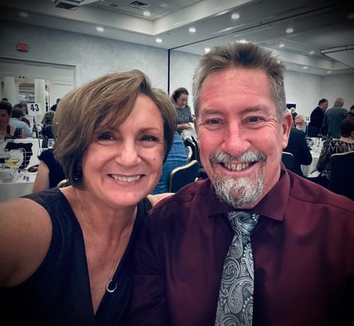 A smiling customer showing radiant skin after using The Micro Infusion System™.