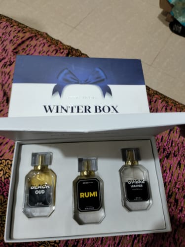 Customer's OUD Supreme BUNDLE in its open 'Winter Box', showing the three included perfume bottles.