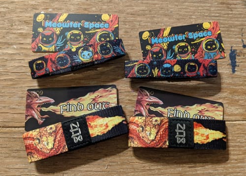 Customer shows two sets of duplicate wristbands and cards received in their Winter Wonderland Mega Mystery 10-Pack.