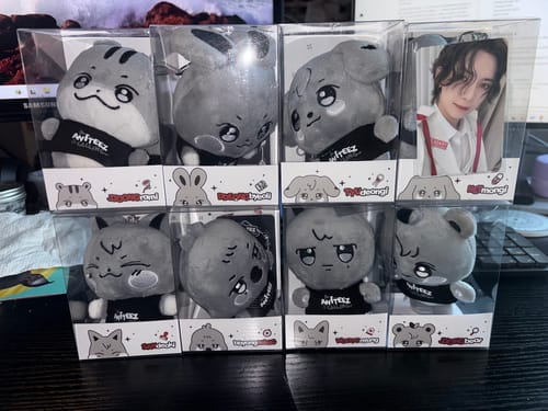 Reviewer's set of eight grey ANITEEZ PLUSH KEYRINGs displayed in their original boxes with a photocard.