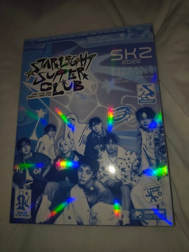 Customer's view of the STRAY KIDS STARLIGHT SUPPER CLUB 2026 SEASON'S GREETINGS box, featuring a blue holographic cover.