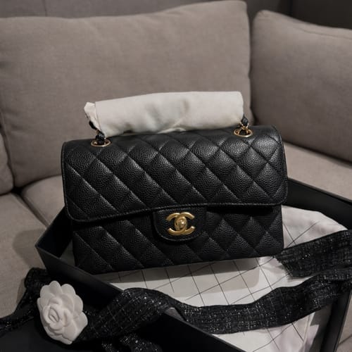 Customer photo review of Chanel Black Quilted Caviar Small Classic Flap Gold Hardware Bag