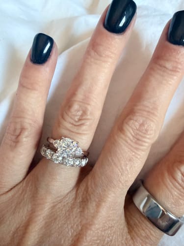 Customer photo review of Three Stone Cushion Moissanite Trillion Side Stone Engagement Ring