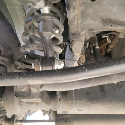 Customer's new Cummins Sway Bar End Link Kit installed on the suspension of their truck.