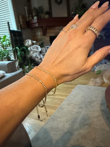 Reviewer's wrist showing the delicate, double-stranded Luna Bracelet Bundle.