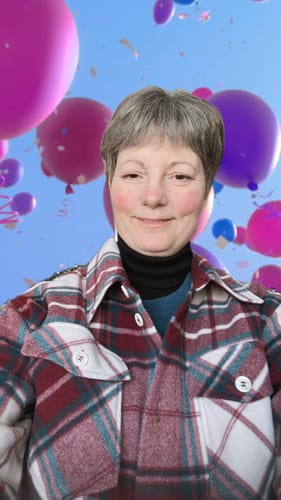 Customer wearing the open Sawyer Shacket in a warm Frozen Cranberry Plaid.