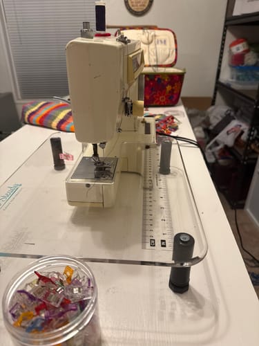 Customer's clear Sew Steady Sewing Machine Extension Table fitted around a vintage sewing machine on a desk.