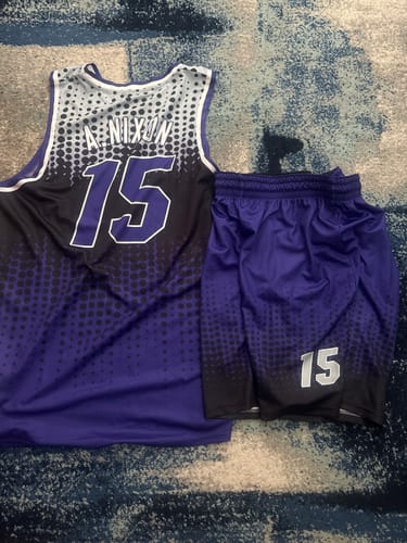 Customer's custom basketball uniform in a purple gradient dot pattern, showing the name 'A. NIXON' and number '15' on the back.