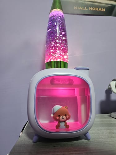 Customer's ATEEZ JONGHO Cloudy Light on a desk, glowing with a soft pink light inside.