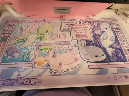 Customer photo review of Virtual Sea Pet Desk Mat!