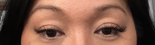 Close-up of a reviewer's eyes showing a full, winged style using the Dreamy lashes.