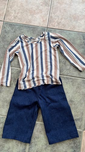 Customer's finished long-sleeve shirt made from the soft, vertically striped Viscose Jersey, shown with denim trousers.