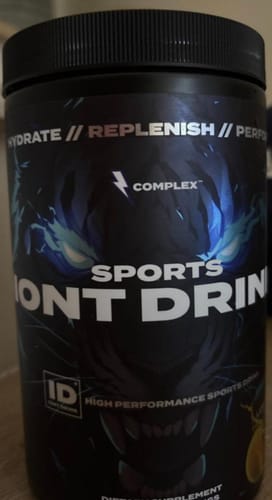 Close-up of a reviewer's Complex Iont Drink, showing the product's dark, fierce packaging.