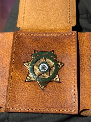 Customer photo review of Badge Trifold Wallet - Chestnut Brown