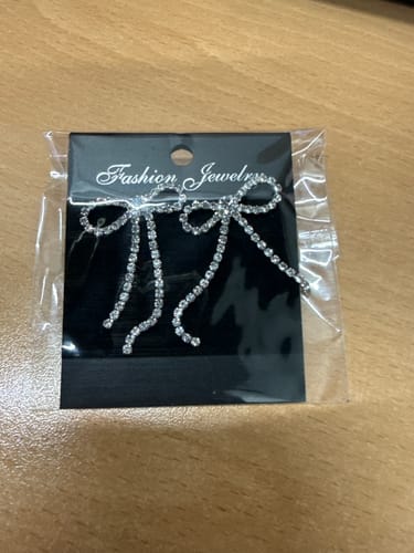 Customer photo review of Aretes de lazos plateados