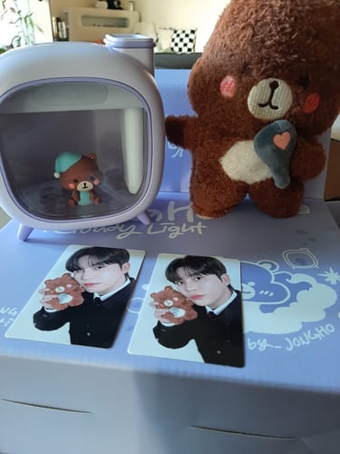 Customer's unboxed ATEEZ - JONGHO : CLOUDY LIGHT set, showing the light, a plush bear, and two photocards on the box.