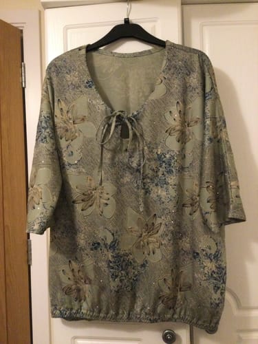 Customer's top made from the mint Diamante Printed Viscose, showing the fabric's floral pattern and drape.