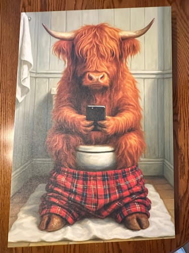 Customer photo review of Highland Cow On The Phone On The Toilet