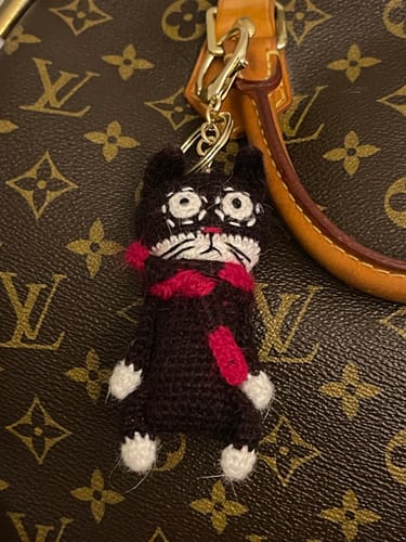 Customer photo review of 🐈⬛ Slightly Unhinged Cat – Bag Charm/Keychain/Brooch