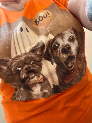 Customer's orange Personalized Halloween Shirt featuring a spooky ghost and a custom photo of two dogs.