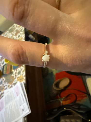 Customer photo review of Solid Opal and Diamond Trilogy Ring in 9ct Yellow Gold