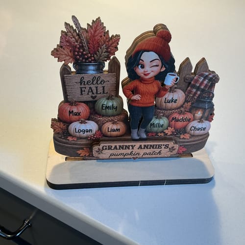 Reviewer's Hello Fall Grandma's Pumpkin Patch personalized wooden plaque on a display base.