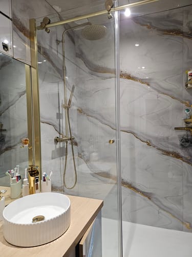 Customer photo review of Panneau Mural PVC Effet Marbre Doré – Étanche et facile à poser