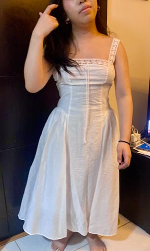 Customer's white Lace Trim Square Neck Strap A-Line Midi Slip Dress worn by a person, showing the fitted bodice.