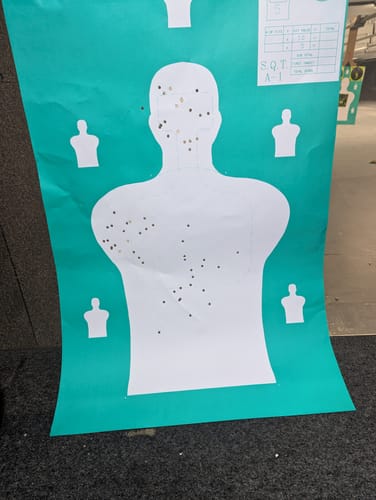 Reviewer's paper target showing accurate shot groupings after using the Site Right™ 2.0 Boresighter.