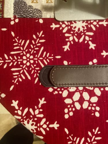 Customer's close-up showing The Reversible belt is slightly shorter than another similar brown leather belt.