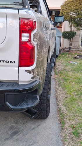 Customer's white truck with 1.5-inch wheel spacers installed, creating a wider wheel stance.
