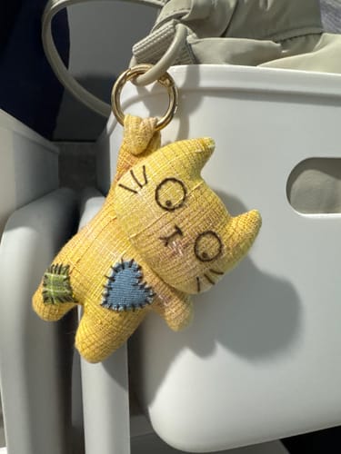 Customer photo review of Paw-Stuck Kitty Bag Charm