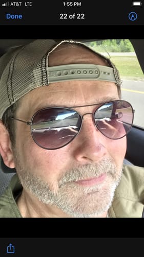 A close-up selfie of the reviewer for Meraki Blu Methylene Blue, looking pleased.