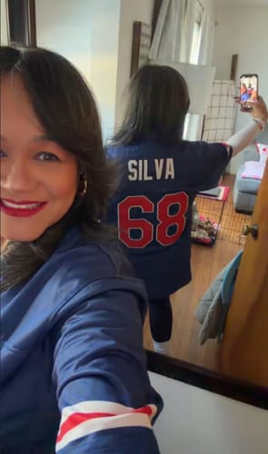 Customer's mirror selfie showing the back of the blue Puerto Rico Heritage Custom Football Jersey with the name "SILVA" and number "68".