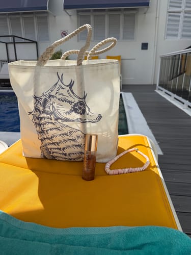 Customer photo review of SPF 50 Sun Glow Luminous Body Oil