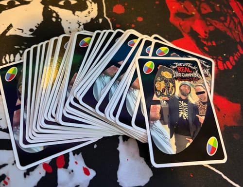 Reviewer's custom stickers, designed like Uno cards with a photo, fanned out on a graphic surface.