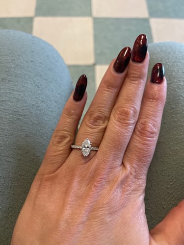 Customer photo review of Naomi 1.5 Carat Marquise Side Stone Moissanite Engagement Ring in 14k White Gold