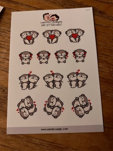 A customer's sheet of 'My Otter Half' planner stickers showing cute otter couples with hearts.