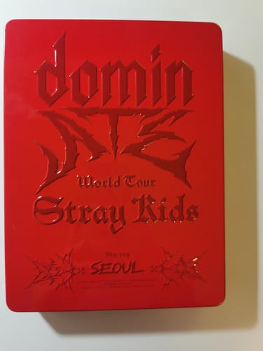 Customer showing the red, embossed outer box for the STRAY KIDS dominATE SEOUL WORLD TOUR BLU-RAY.