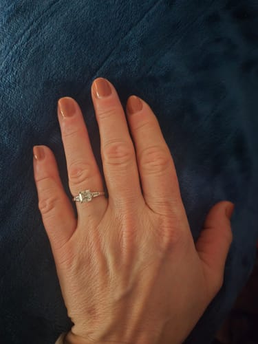 Customer photo review of Three Stone Heart Moissanite Tapered Baguette Engagement Ring