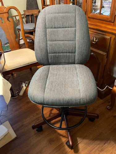 Customer's fully assembled Koala SewComfort Sewing Chair in jade fabric with a dark wood finish, on a hardwood floor.