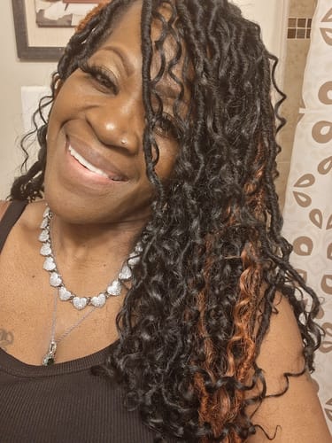 Close-up of a customer's joyful smile, highlighting her new Pop On Veneers.