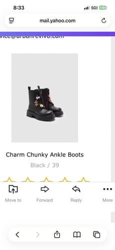 Reviewer's screenshot of the product photo for the black Charm Chunky Ankle Boots with charms.