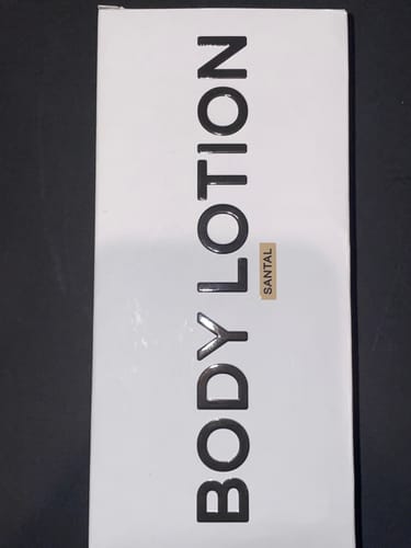 Customer's white box for the Body Lotion, showing the Santal scent.